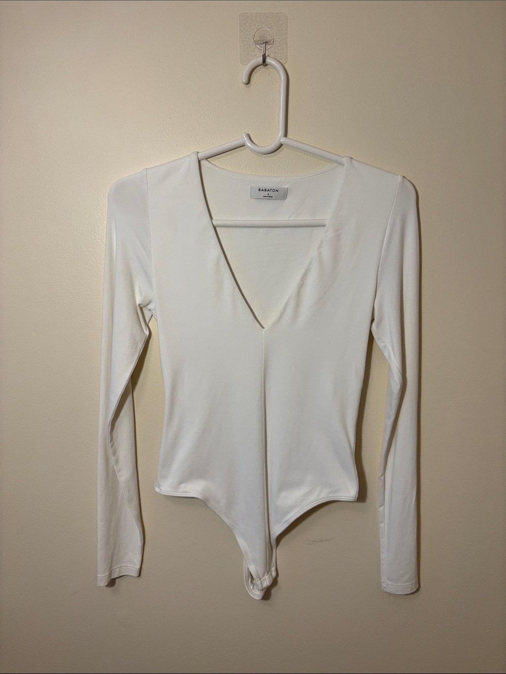 Babaton White V-Neck Long Sleeve Bodysuit